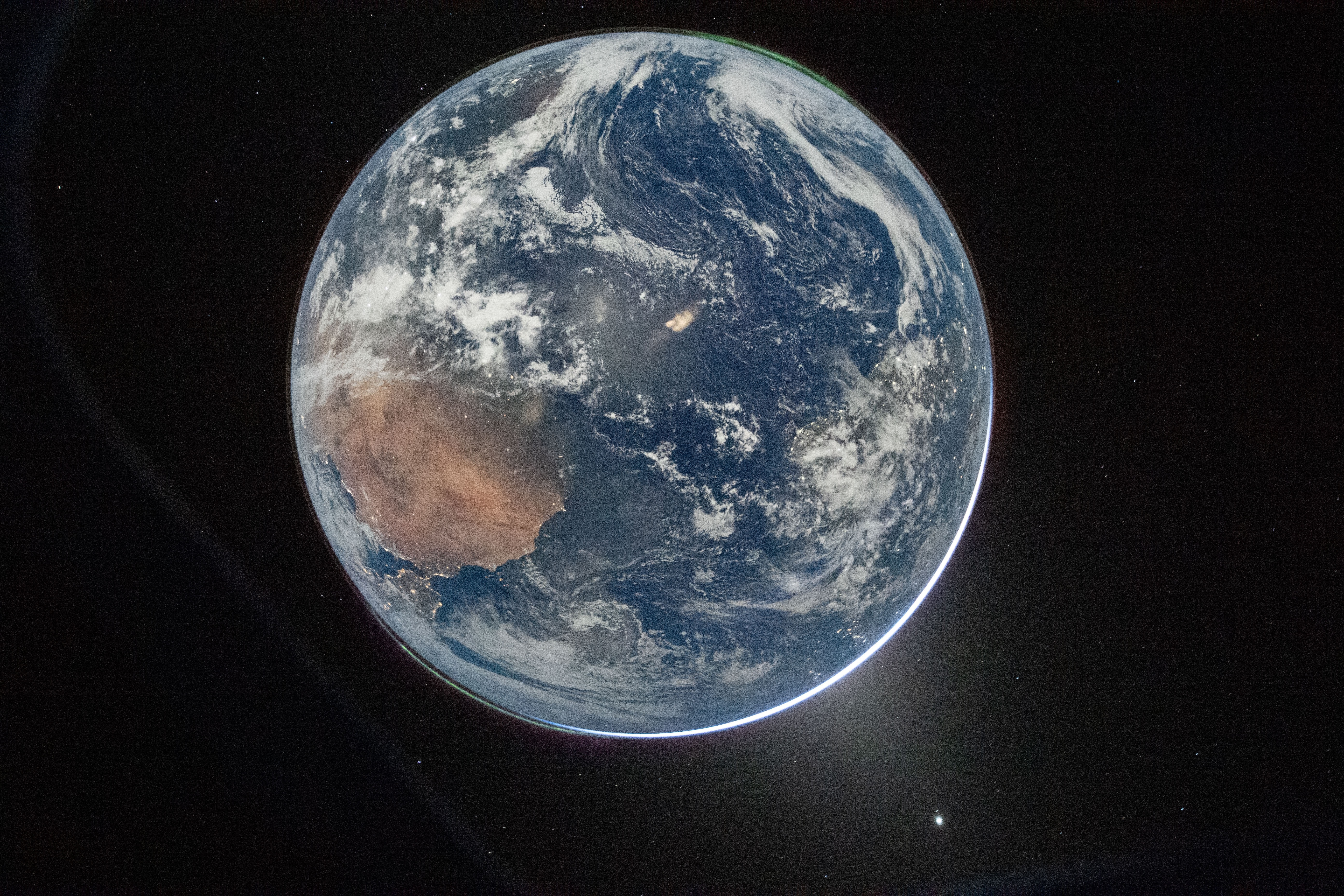 NASA astronaut and Artemis II Commander Reid Wiseman took this picture of Earth from the Orion spacecraft's window on April 2, 2026, after completing the translunar injection burn. Image Credit: NASA/Reid Wiseman